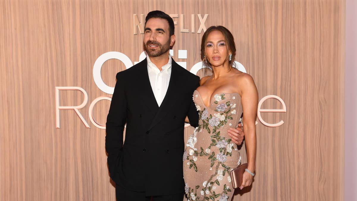 Jennifer Lopez and Brett Goldstein together at a premiere for their film Office Romance