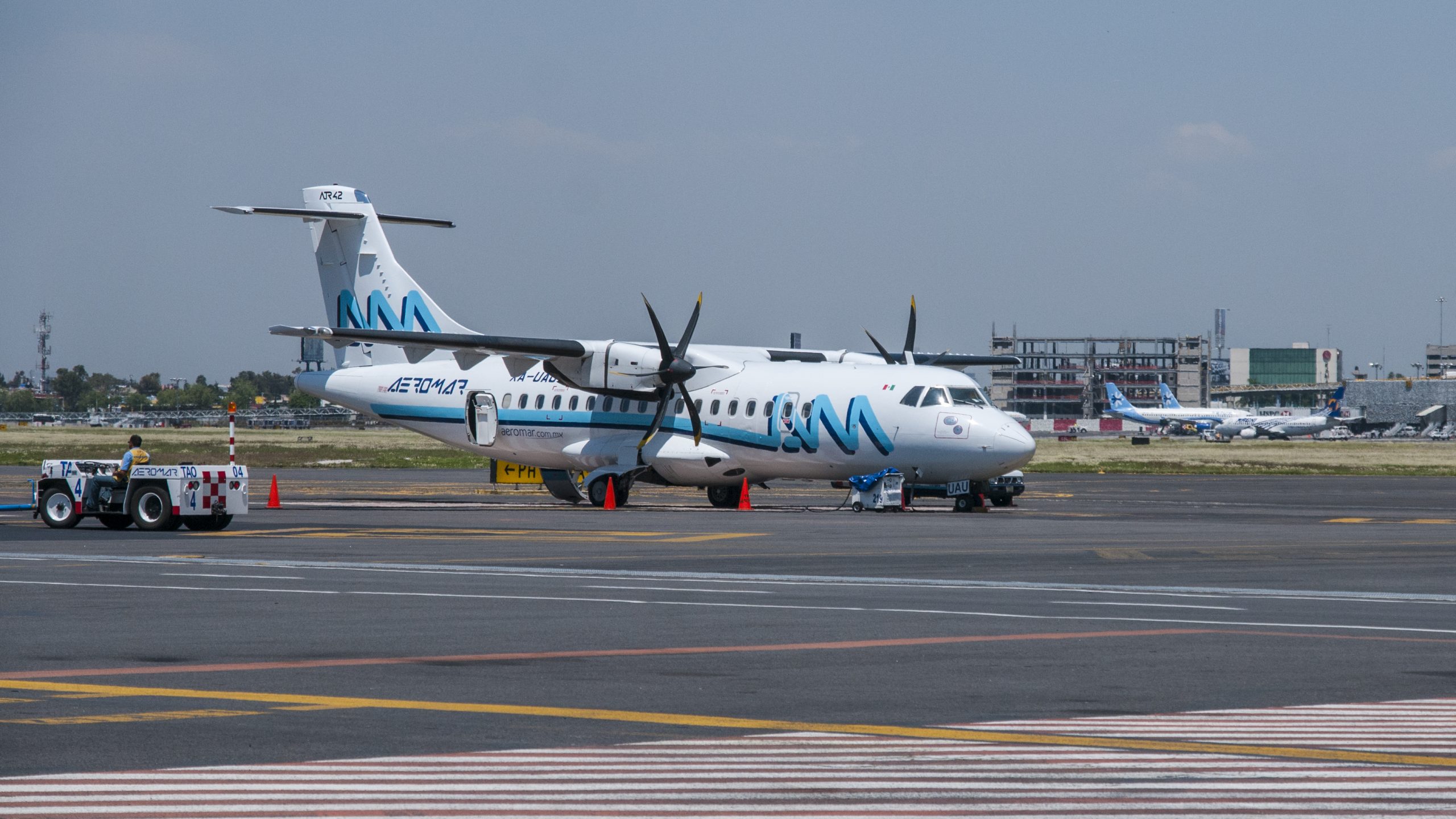 ATR 42 at an airport — illustrative file photo White ATR 42 twin-turboprop aircraft parked on an airport apron.
