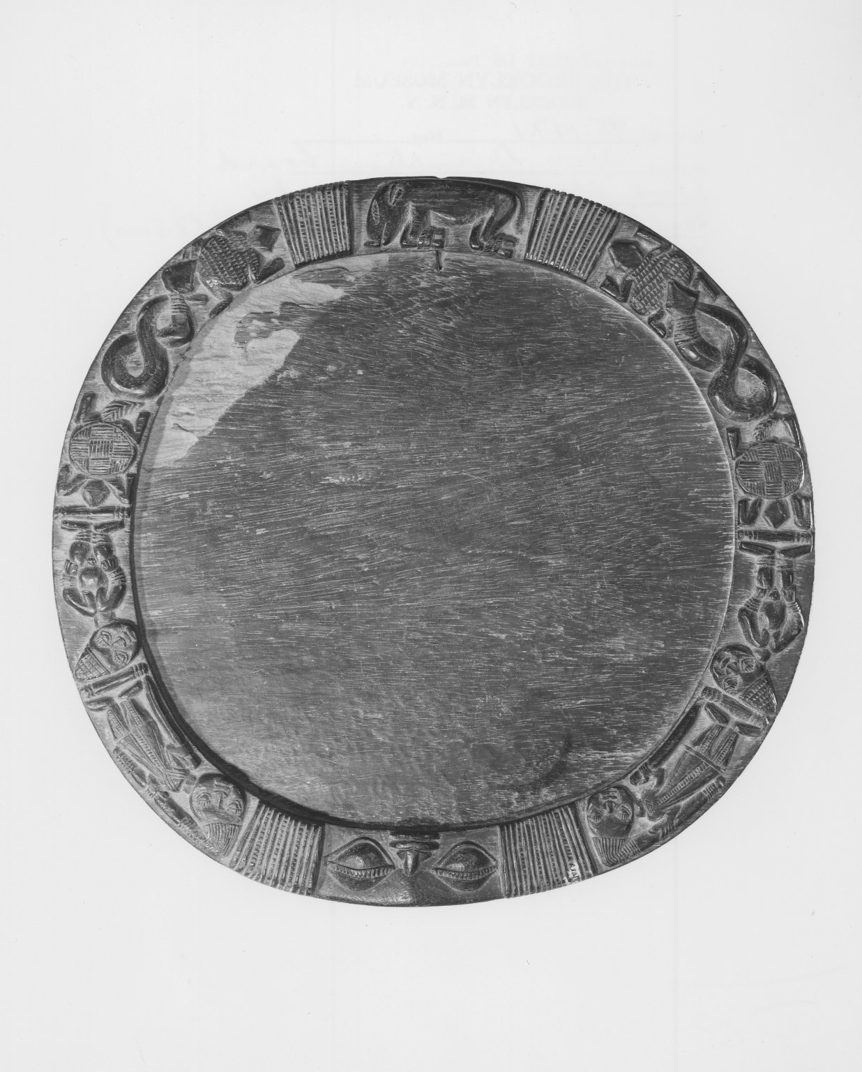 A carved Yoruba opon Ifa divination tray from the Brooklyn Museum collection