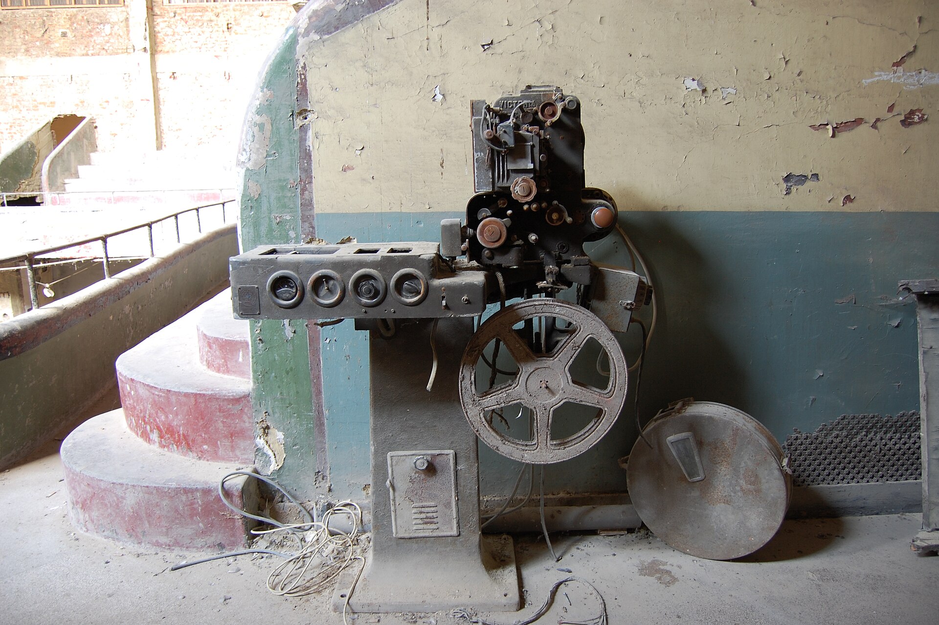 A movie projector in an abandoned theatre