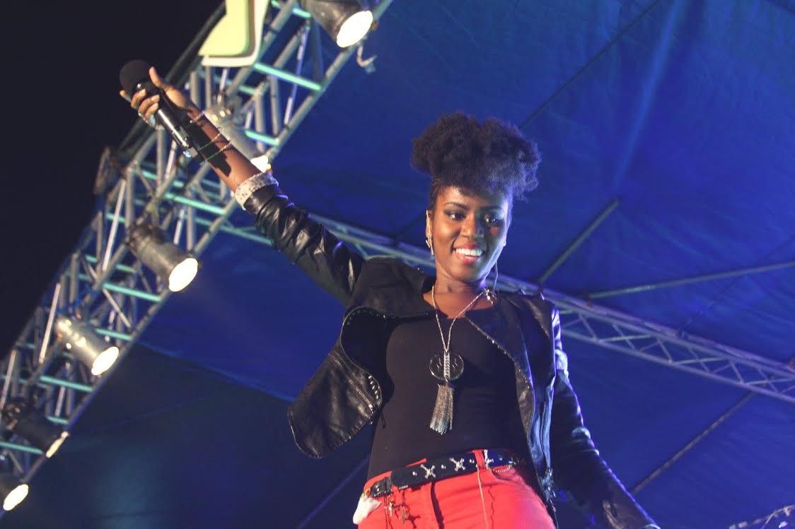 MzVee performing live onstage in Ghana