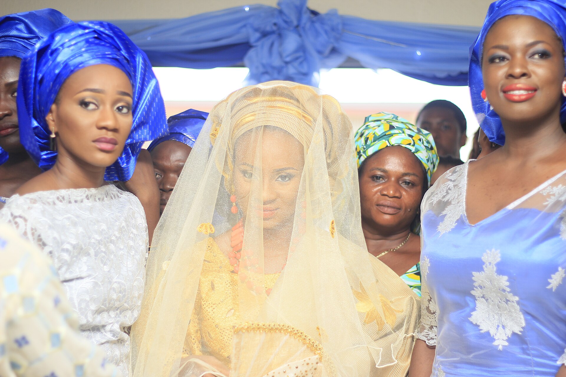 nigerian-wedding-fashion Yoruba wedding guests in traditional attire; illustrative image, not a photograph from the Zlatan and Davita ceremony.