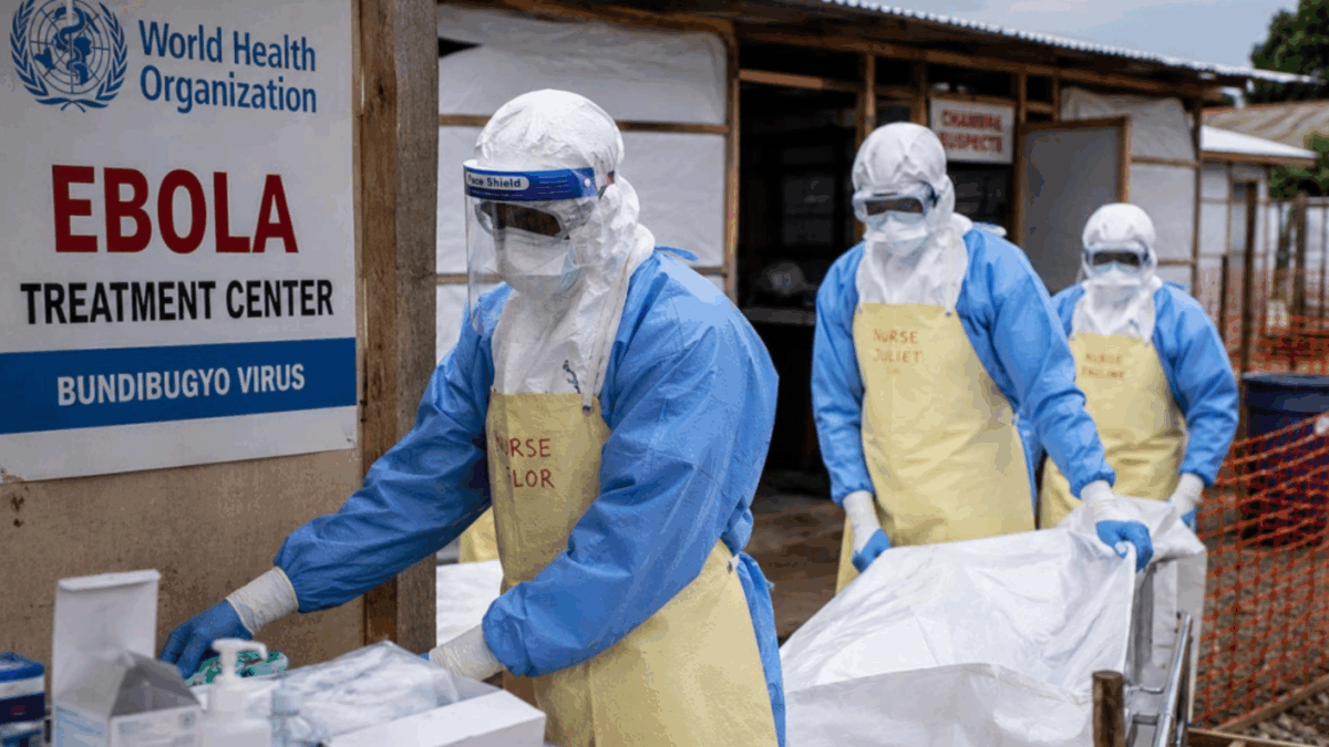 Health workers in protective equipment at a Bundibugyo Ebola treatment centre in an archival outbreak image
